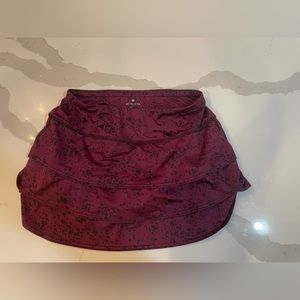 Athleta running skirt with built in shorts.